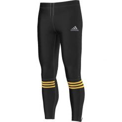 Kalesony męskie: Adidas Legginsy Response Long Tights czarno-żółte r. S (AP5287)