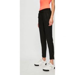 Tally Weijl - Spodnie. Czarne spodnie damskie TALLY WEIJL, bez wzorów, z wiskozy, casualowe. W wyprzedaży za 49,90 zł.