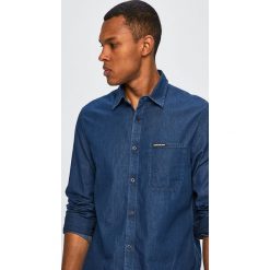 Calvin Klein Jeans - Koszula. Niebieskie koszule męskie marki Calvin Klein Jeans, s, bez wzorów, z bawełny, klasyczne, z klasycznym kołnierzykiem, z długim rękawem. Za 359,90 zł.