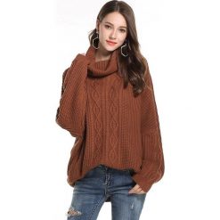 Sweter w kolorze jasnobrązowym. Pomarańczowe swetry damskie Swetry na chłodne dni, bez wzorów, ze splotem, bez rękawów, bez kaptura. W wyprzedaży za 119,95 zł.