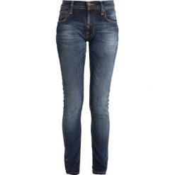 Nudie Jeans TIGHT TERRY Jeansy Slim Fit mid used saver. Niebieskie jeansy damskie marki Nudie Jeans, bez wzorów, z elastanu. Za 579,00 zł.