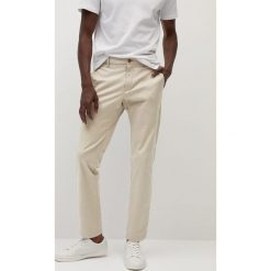 Mango Man - Spodnie Prato. Niebieskie spodnie męskie Mango Man, bez wzorów, z elastanu. Za 139,99 zł.