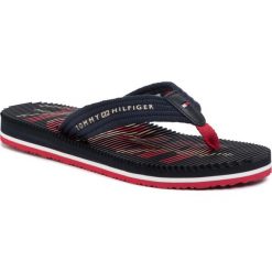 Japonki TOMMY HILFIGER Signature Footbed Beach Sandal FW0FW04624. Niebieskie klapki damskie TOMMY HILFIGER, bez wzorów, bez obcasa. W wyprzedaży za 119,00 zł.