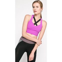Reebok - Biustonosz. Fioletowe biustonosze sportowe damskie Reebok, s, bez wzorów, z elastanu. W wyprzedaży za 119,90 zł.