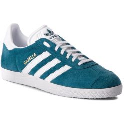 Buty adidas - Gazelle B41654 Petnit/Ftwwht/Ftwwht. Niebieskie buty sportowe damskie Adidas, bez wzorów, z zamszu, eleganckie, Adidas Gazelle. W wyprzedaży za 269,00 zł.