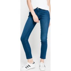 Tommy Hilfiger - Jeansy Milan. Niebieskie rurki damskie TOMMY HILFIGER, z elastanu. W wyprzedaży za 299,90 zł.