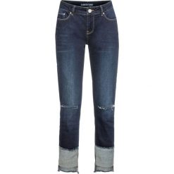 Dżinsy SKINNY w krótszej długości, z wstawką bonprix ciemny denim. Niebieskie jeansy damskie bonprix, bez wzorów, z jeansu. Za 64,99 zł.