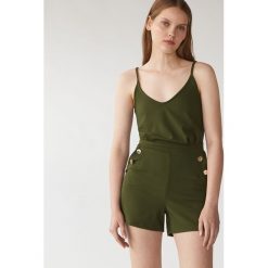 Kombinezon z ozdobnymi guzikami Eco Aware - Khaki. Brązowe kombinezony damskie Mohito, s, bez wzorów, bez kołnierzyka, bez rękawów. Za 99,99 zł.