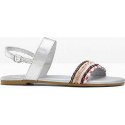 Sandały dziecięce bonprix srebrny. Szare sandały dziewczęce bonprix, z paskami. Za 34,99 zł.