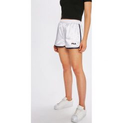 Fila - Szorty. Białe spodenki sportowe damskie Fila, s, bez wzorów, z poliesteru, sportowe, z podwyższonym stanem. W wyprzedaży za 119,90 zł.