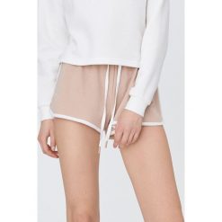 Krótkie dresowe szorty - Beżowy. Brązowe szorty damskie Sinsay, s, bez wzorów, z dresówki. Za 19,99 zł.
