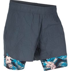 Szorty sportowe funkcyjne 2 w 1 bonprix nocny niebieski z nadrukiem. Niebieskie spodnie damskie bonprix, z nadrukiem, sportowe. Za 99,99 zł.
