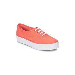 Buty Keds TRIPLE SEASONAL SOLID. Pomarańczowe trampki i tenisówki damskie marki Keds, bez wzorów, bez zapięcia. Za 215,20 zł.