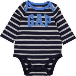 Body w kolorze granatowym. Niebieskie body niemowlęce Gap Kids, w paski, z bawełny, bez rękawów. W wyprzedaży za 22,95 zł.