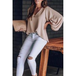 Bluzka damska MERZA BEIGE. Brązowe bluzki damskie IVET, xl, bez wzorów, z materiału, eleganckie, bez kołnierzyka, bez rękawów. W wyprzedaży za 89,00 zł.