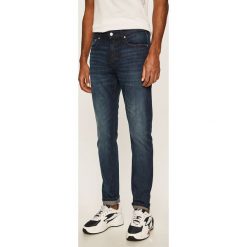 Calvin Klein Jeans - Jeansy Slim Taper. Niebieskie jeansy męskie Calvin Klein Jeans, m, bez wzorów. Za 449,90 zł.