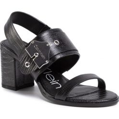 Sandały CALVIN KLEIN - Carlita B4E7938 Black. Czarne klapki damskie Calvin Klein, z aplikacjami, ze skóry, bez obcasa, na obcasie. W wyprzedaży za 539,00 zł.