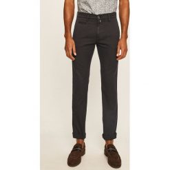 Pierre Cardin - Spodnie. Niebieskie spodnie męskie Pierre Cardin, na co dzień, bez wzorów, z elastanu. Za 429,90 zł.