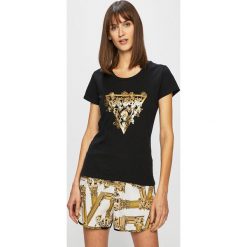 Guess Jeans - Top. Niebieskie bluzki damskie Guess Jeans, s, z nadrukiem, z bawełny, z okrągłym kołnierzem. W wyprzedaży za 129,90 zł.