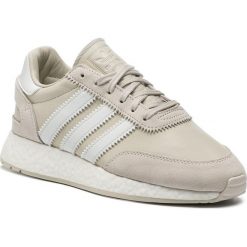 Buty adidas - I-5923 BD779 Rawwht/Crywht/Ftwwht. Brązowe półbuty męskie Adidas, na co dzień, bez wzorów, z zamszu, klasyczne, bez zapięcia. W wyprzedaży za 389,00 zł.
