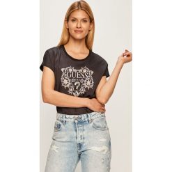 Guess Jeans - T-shirt. Czarne bluzki damskie Guess Jeans, s, z aplikacjami, z elastanu, casualowe, z okrągłym kołnierzem. Za 319,90 zł.