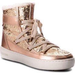 Śniegowce MOON BOOT - Pulse Z.Glitter 24103100002 Gold. Żółte kozaki damskie Moon Boot, na zimę, ze skóry ekologicznej, bez zapięcia. W wyprzedaży za 529,00 zł.