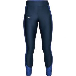 Legginsy w kolorze granatowym. Legginsy marki Under Armour, xs, z materiału. W wyprzedaży za 119,95 zł.