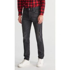 Jeansy slim fit - Czarny. Czarne jeansy damskie relaxed fit marki Reserved. Za 129,99 zł.