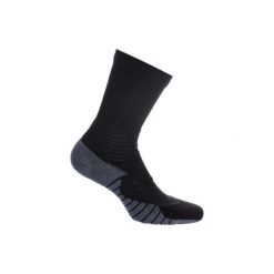 Skarpety do gry w koszykówkę SO900 MiD. Pomarańczowe skarpetki męskie TARMAK, bez wzorów, z elastanu. Za 49,99 zł.