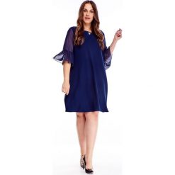 Sukienka z tiulowymi rękawami granatowy. Niebieskie sukienki damskie Tagless, plus size, bez wzorów, z elastanu, bez kołnierzyka, plus size, bez rękawów. Za 207,89 zł.
