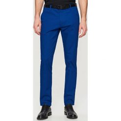 Chinosy męskie: Spodnie chino slim fit – Niebieski