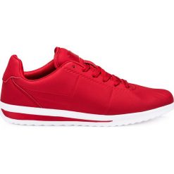 BUTY MĘSKIE SPORTOWE SNEAKERSY T200 - CZERWONE. Czerwone halówki męskie marki Nike, do piłki nożnej. Za 79,00 zł.