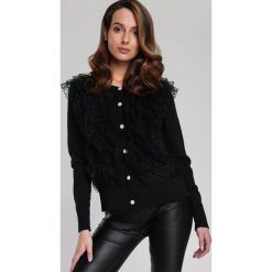 Czarny Sweter Iqrah. Czarne swetry damskie Renee, s, w koronkowe wzory, z koronki, eleganckie, długie. Za 119,99 zł.