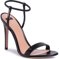 Sandały ELISABETTA FRANCHI - SA-84F-02E2-V439 Nero 110. Czarne klapki damskie Elisabetta Franchi, bez wzorów, ze skóry, bez obcasa, na obcasie. W wyprzedaży za 1399,00 zł.