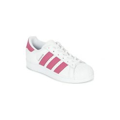 Buty Dziecko adidas SUPERSTAR J. Białe trampki dziewczęce Adidas, bez wzorów, bez zapięcia. Za 199,99 zł.