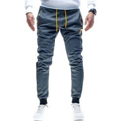 Spodnie męskie dresowe grafitowe Recea. Szare spodnie męskie Recea, na co dzień, xl, bez wzorów, z bawełny, sportowe. Za 44,99 zł.