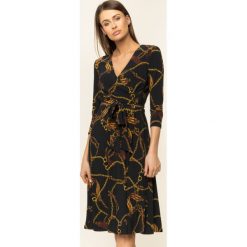 Sukienka koktajlowa Lauren Ralph Lauren 250781774. Czarne sukienki damskie Lauren Ralph Lauren, na co dzień, bez wzorów, z elastanu, bez kołnierzyka, bez rękawów, proste. W wyprzedaży za 579,00 zł.