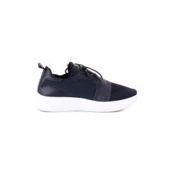 Buty Calvin Klein Jeans SE8596. Niebieskie trampki męskie Calvin Klein Jeans, bez wzorów, z jeansu, bez zapięcia. Za 359,78 zł.