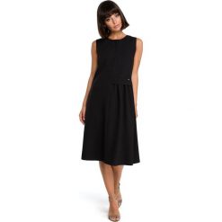 AGNES Zwiewna sukienka midi bez rękawów - czarna. Czarne sukienki na komunię marki BE, l, z tkaniny, bez rękawów, midi, oversize. Za 139,99 zł.