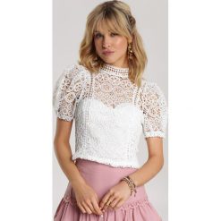 Biała Bluzka Theminiassi. Białe bluzki damskie Renee, s, bez wzorów, bez kołnierzyka, bez rękawów. Za 99,99 zł.