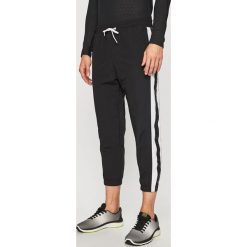 Reebok - Spodnie. Czarne spodnie męskie Reebok, xl, z bawełny, sportowe. W wyprzedaży za 139,90 zł.