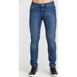 JEANSY SLIM FIT Versace Jeans Couture. Niebieskie jeansy męskie Versace Jeans Couture, m, z aplikacjami. Za 411,95 zł.