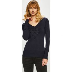 Guess Jeans - Sweter. Niebieskie swetry damskie Guess Jeans, s, z aplikacjami, z elastanu, z krótkim rękawem, krótkie, bez kaptura. W wyprzedaży za 199,90 zł.