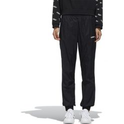 ADIDAS FAVORITES PANTS > FM6186. Pomarańczowe spodnie damskie Adidas, m, z bawełny, z standardowym stanem. Za 179,99 zł.