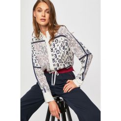 Tommy Hilfiger - Koszula. Białe bluzki damskie TOMMY HILFIGER, bez wzorów, z wiskozy, bez kołnierzyka, z długim rękawem. Za 549,90 zł.