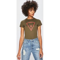 Guess Jeans - Top. Białe bluzki damskie Guess Jeans, s, z nadrukiem, z bawełny, casualowe, z okrągłym kołnierzem. W wyprzedaży za 89,90 zł.