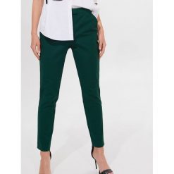 Spodnie cygaretki short length - Khaki. Brązowe spodnie damskie Mohito. Za 119,99 zł.