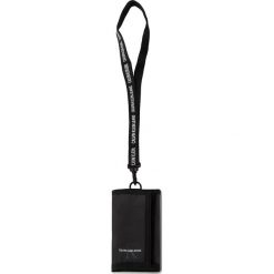 Duży Portfel Damski CALVIN KLEIN JEANS - Monogram Nylon Ns Wallet K60K605546 084. Czarne portfele damskie Calvin Klein Jeans, bez wzorów, z jeansu. Za 139,00 zł.