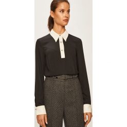 Tommy Hilfiger - Bluzka x Zendaya. Czarne bluzki damskie TOMMY HILFIGER, na co dzień, bez wzorów, z poliesteru, bez kołnierzyka, z długim rękawem. W wyprzedaży za 539,90 zł.