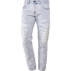 Diesel Black Gold Jeansy Slim Fit light blue denim. Niebieskie jeansy męskie marki Diesel Black Gold, z bawełny. W wyprzedaży za 881,40 zł.